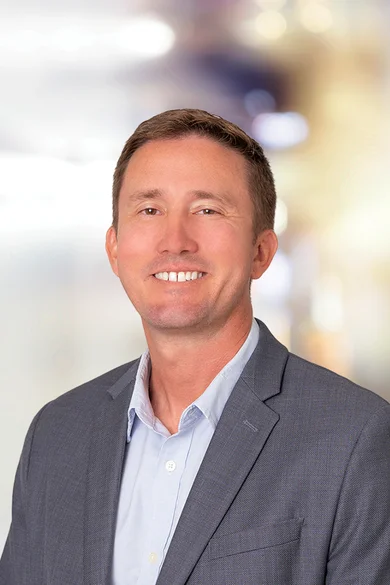 Portrait of Corey Mahoney, REALTOR® | ABR® | RSPS | NRLUX.